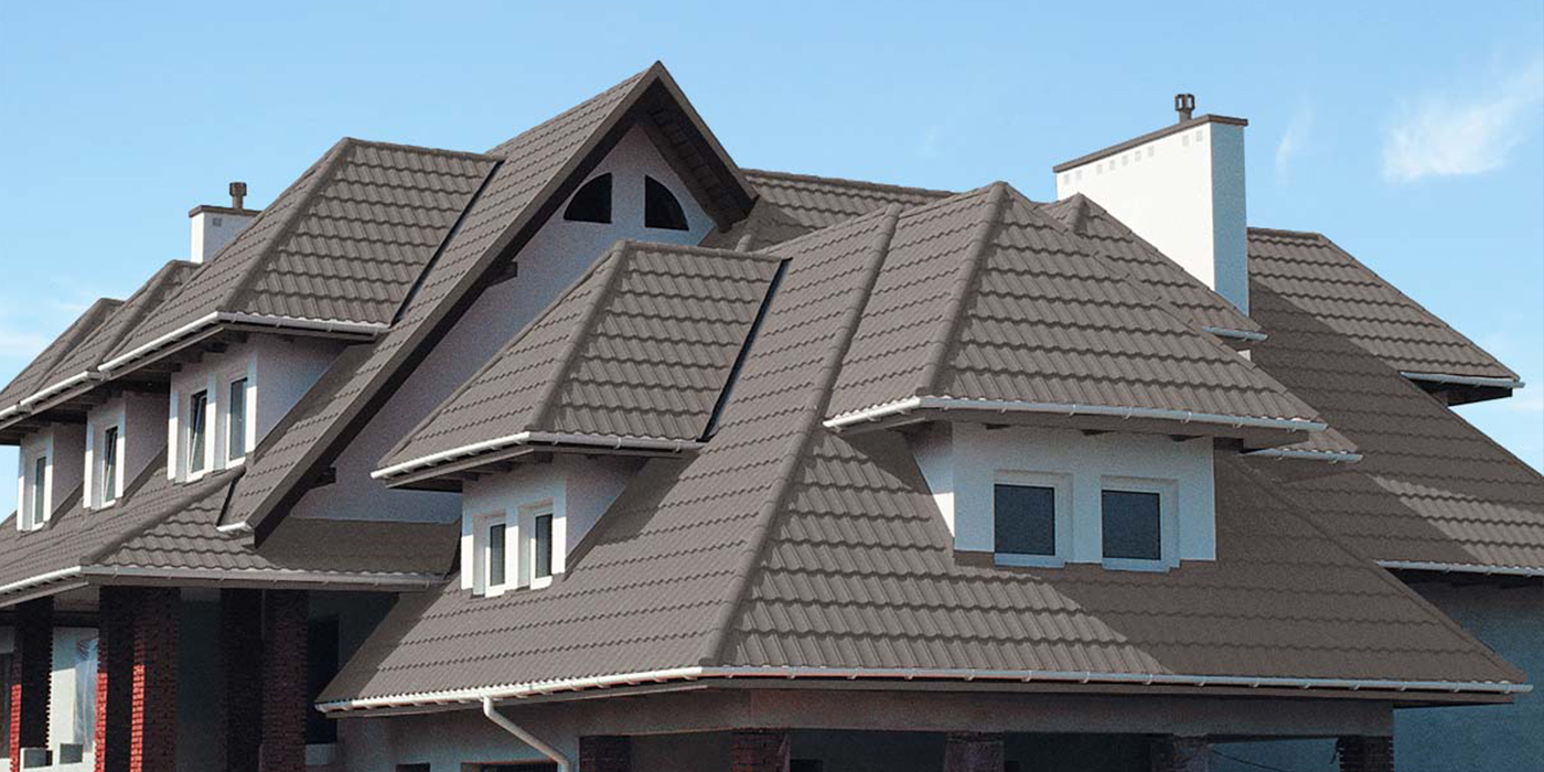 Tejas metálicas revestidas de piedra Edificios con estructuras de techo complejas.jpg